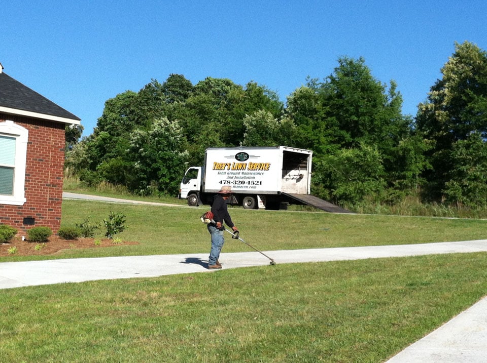 a guy doing Lawn Care Warner Robins GA